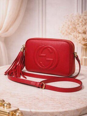 Authentic Gucci Soho Disco Red Leather Crossbody Bag GG Logo Tassel Small Camera
